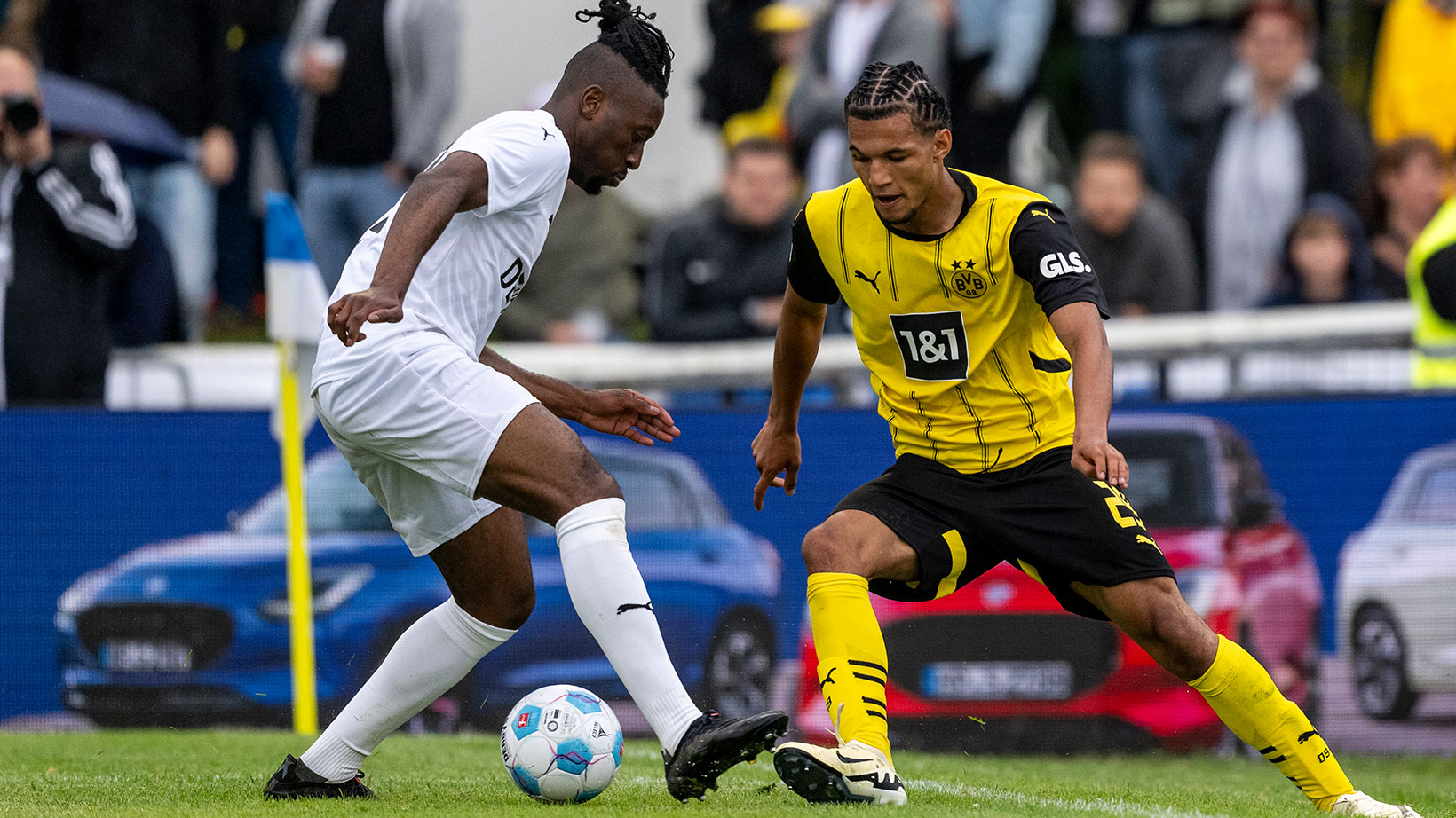 eins gegen eins, dew21 und bvb spieler beim traumspiel